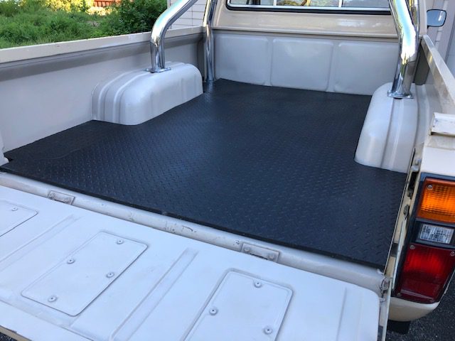 Rubber Floor Mat, All Black Cat® Logo - Cat® Work Truck - Tool Boxes,  Tonneau Covers, Work Truck Products